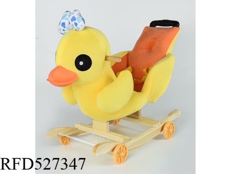 THE BIG YELLOW DUCK PUSHES AND PULLS THE ROCKING CART