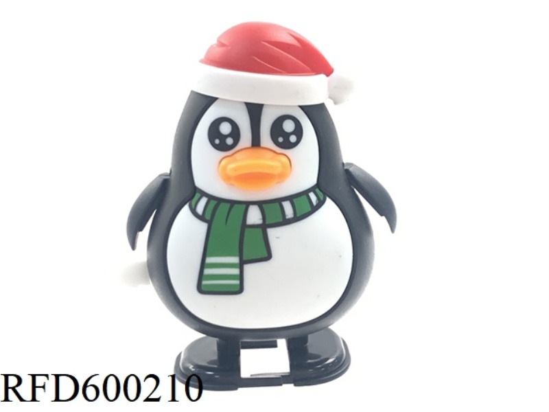 WINDING UP THE CHRISTMAS PENGUIN