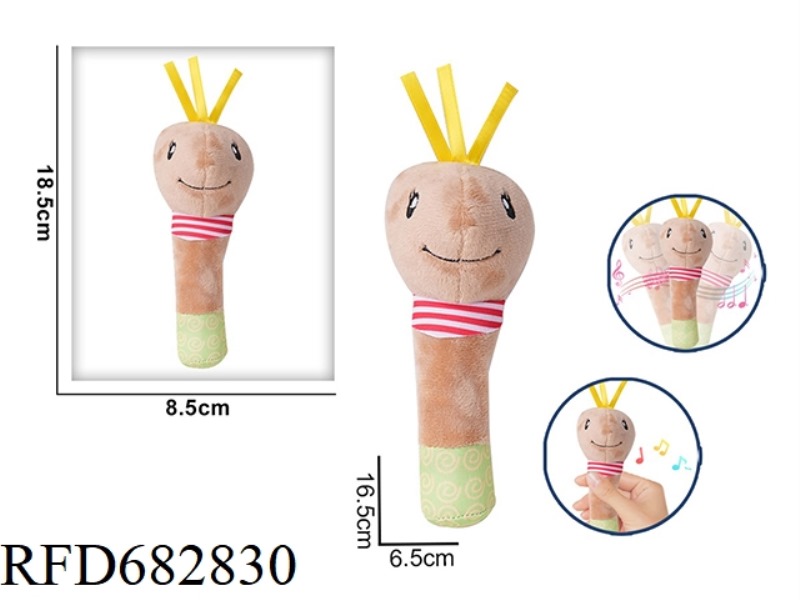 THE LITTLE TURTLE IS HOLDING A RATTLE BB STICK AND PINCHING A PLUSH SOOTHING TOY