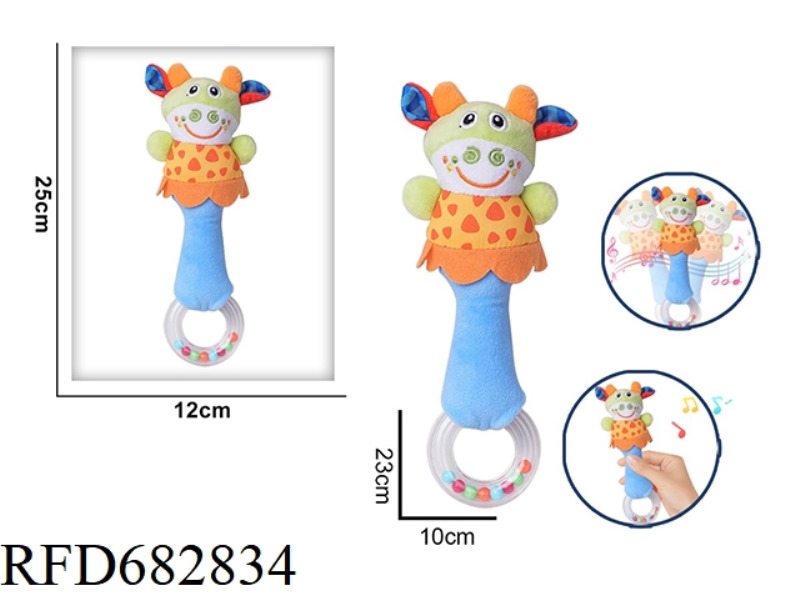 THE CALF IS HOLDING A RATTLE PLUSH SOOTHING TOY IN ITS HAND