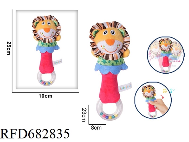 THE LION HOLDS A RATTLE PLUSH SOOTHING TOY IN ITS HAND