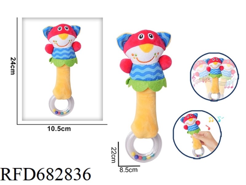 THE KITTEN IS HOLDING A RATTLE PLUSH SOOTHING TOY IN ITS HAND