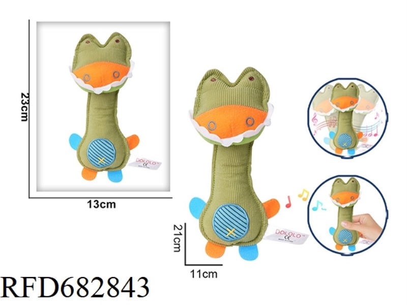 THE CROCODILE HOLDS A RATTLE BB STICK AND PINCHES A PLUSH SOOTHING TOY