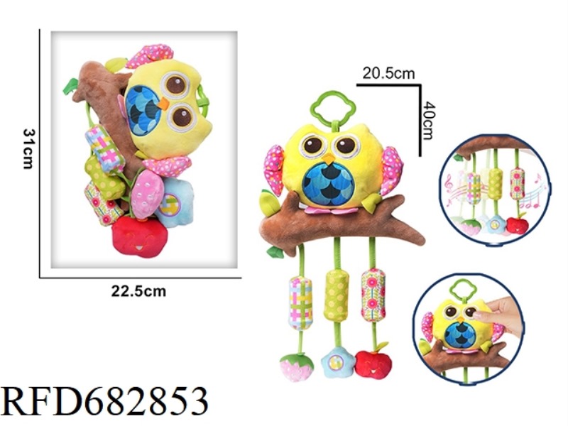 A LARGE WIND CHIME AND A YELLOW OWL PLUSH TOY ARE HUNG IN THE CRIB