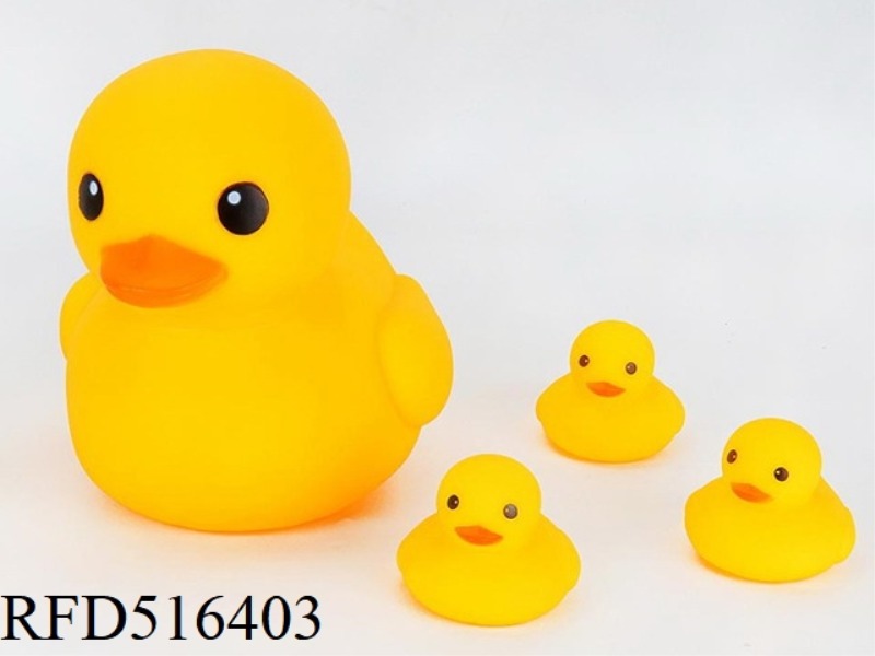 A BIG DUCK WITH THREE DUCKLINGS